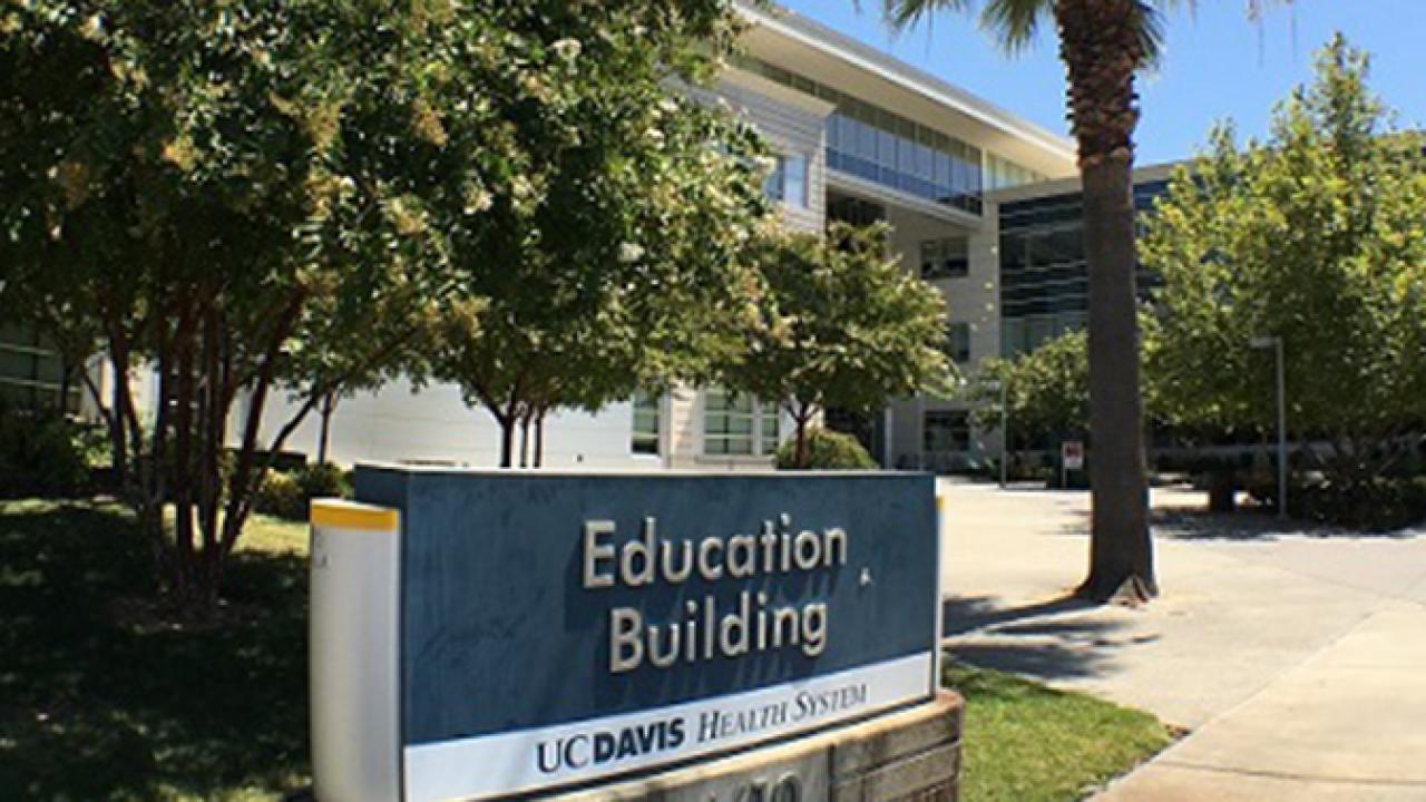 UC Davis Medical School building with a sign that reads education building