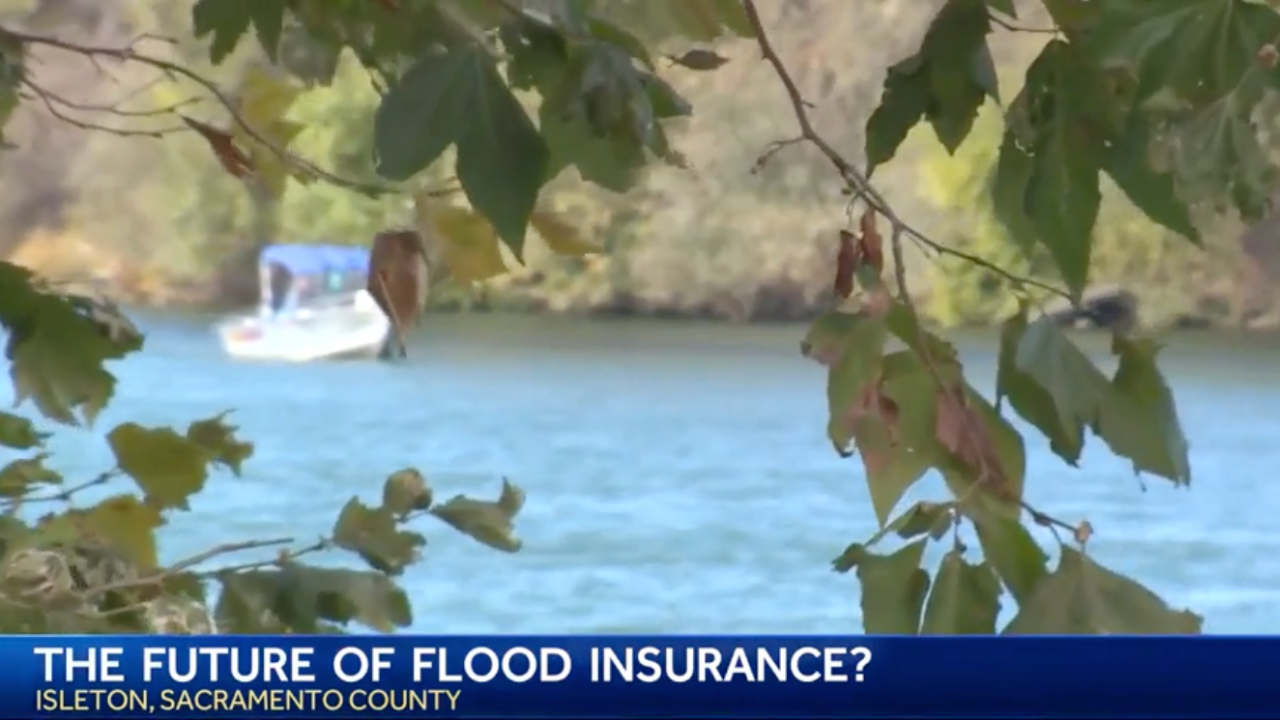 Screenshot of large body of water with a banner across the image with the text "THE FUTURE OF FLOOD INSURANCE? ISLETON, SACRAMENTO COUNTY"