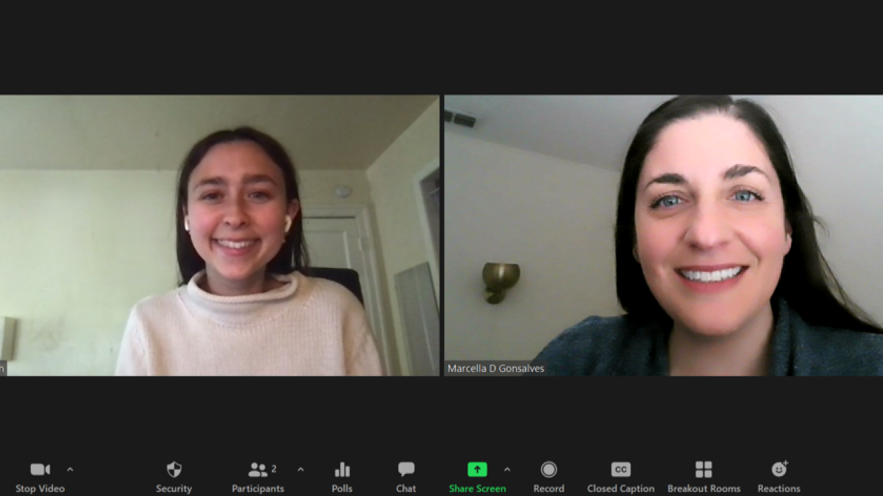 two women on a zoom screen smiling