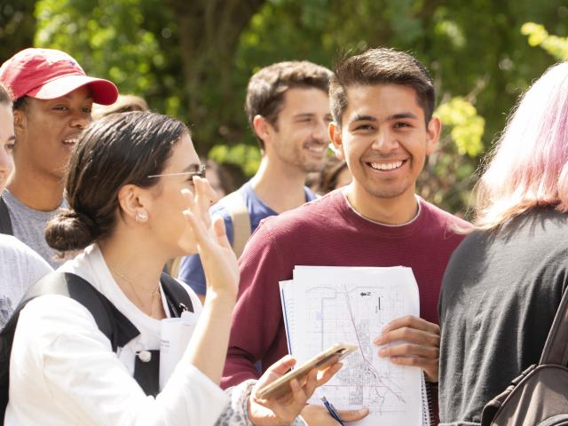 Samuel Landaverde, a landscape design major, laughs with Nikki Moslehi, a sustainable environmental design major. 