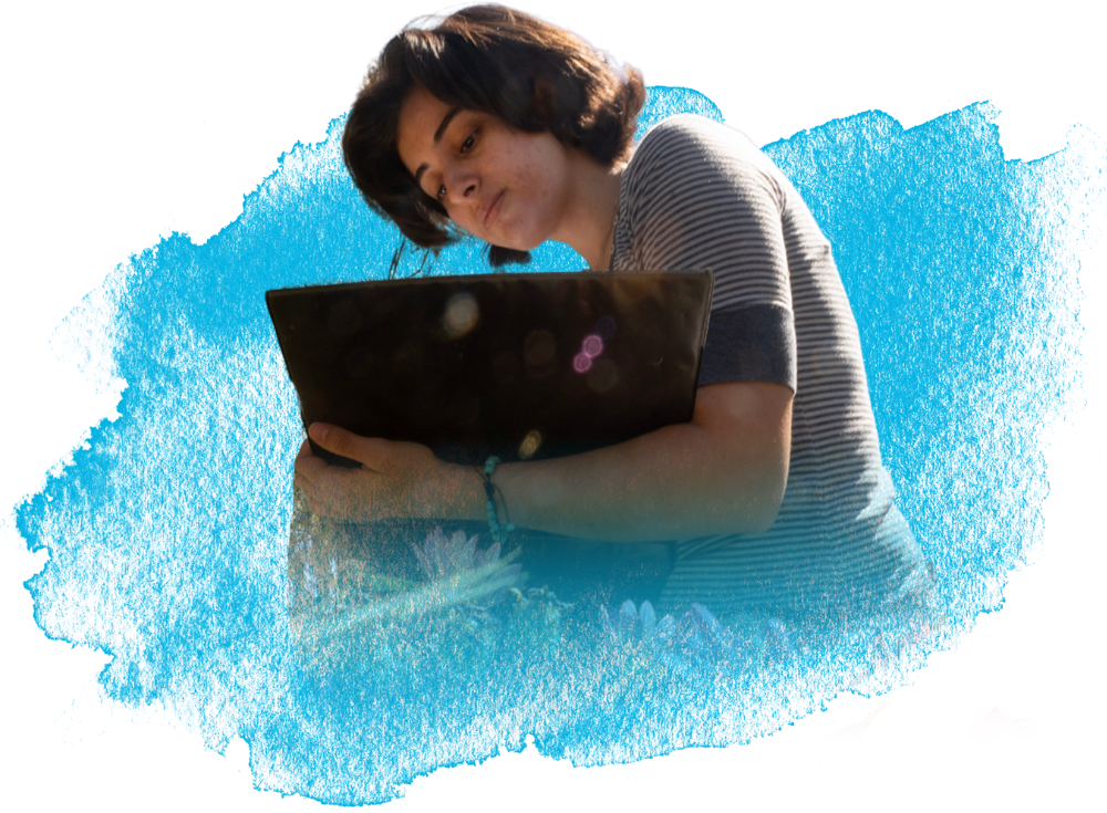 Watercolor brush stroke featuring a student holding and looking down at her laptop