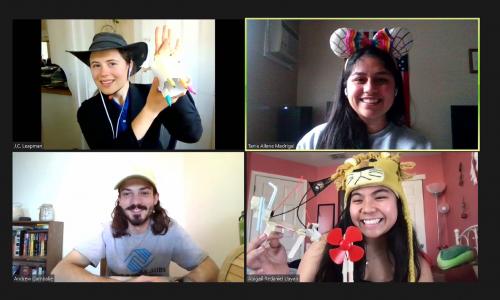 a computer screen casting a Zoom meeting with four squares - three women and one man wearing funny hats