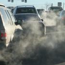 cars in traffic emitting pollution