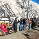UC Davis students stand in a row outside of Hunt Hall.