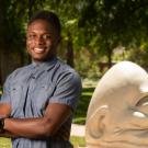 Chiduben Victor Nnaji poses in front of an Egghead 
