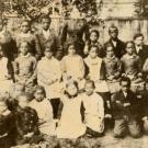 a sepia toned photo of african american children at school
