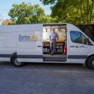 a man standing in front of the Beta Lab maker van